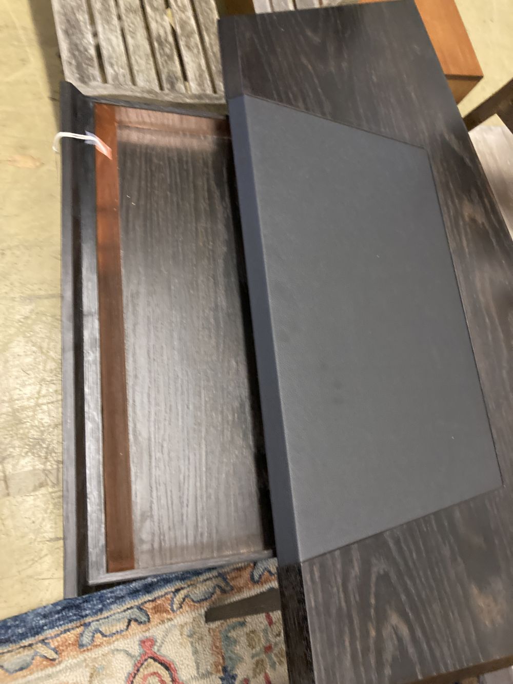 A Christopher Coane design onyx black oak desk, with copper lined push opening drawer, width 118cm, depth 60cm, height 77cm